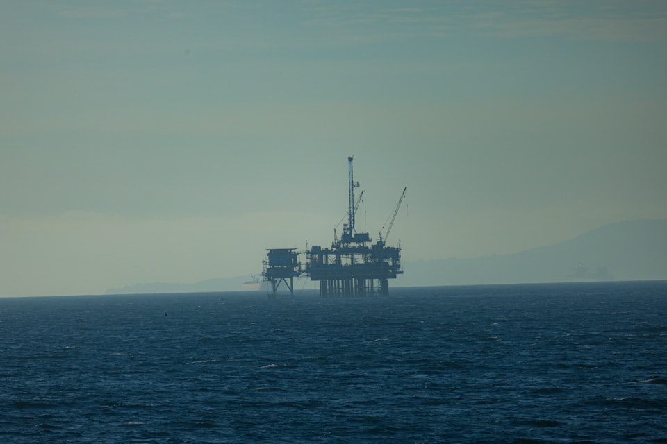 Offshore drilling platform at sunset