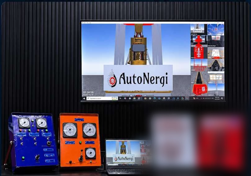 A Hydra-20 portable setup — a large 3D rig-visualization screen above a bench of blue, orange, white and red well-control and choke panels with a laptop running the simulator